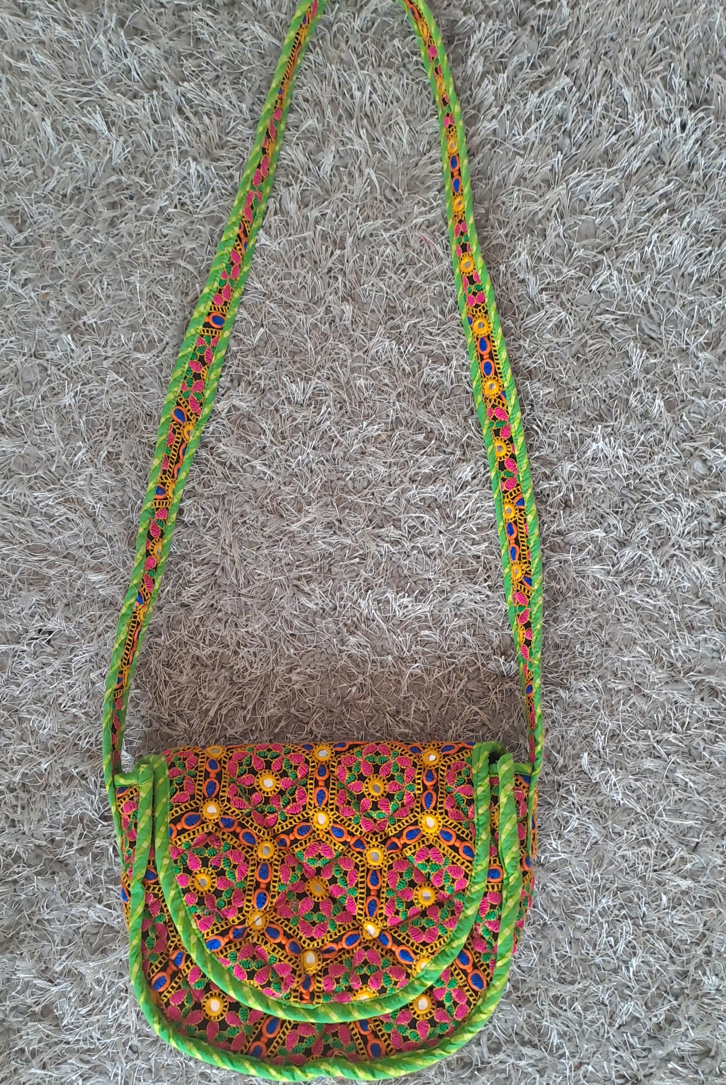 Handcrafted Embroidered Sling Bag with Leather Strap – Vibrant & Elegant