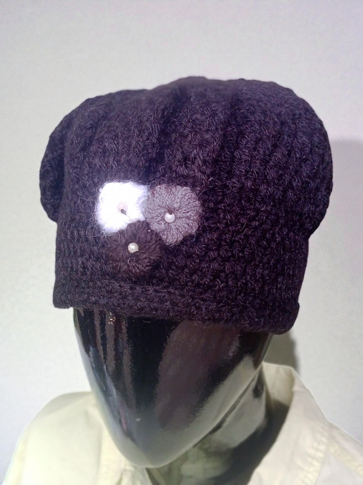 Handcrafted Black Woolen Cap with Floral Knit Motif